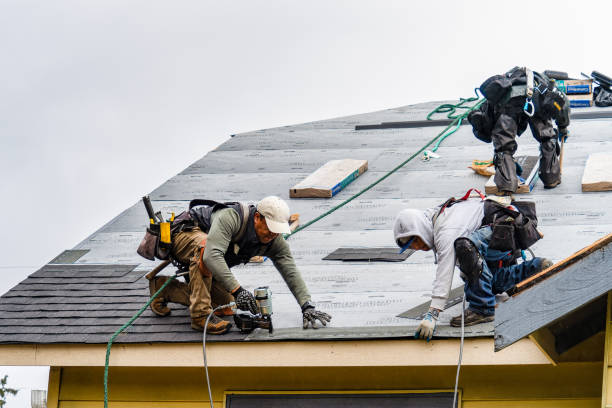 Professional Gutter Installation technician working in Almira, WA